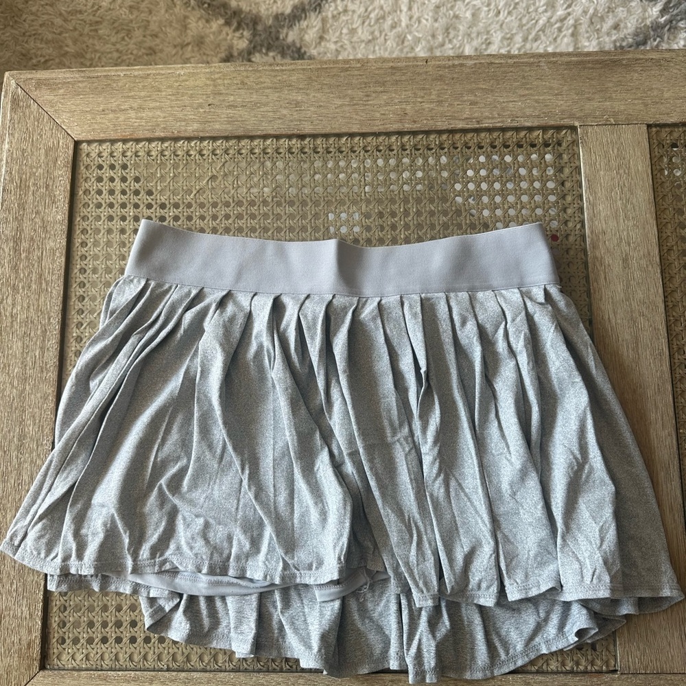Grey tennis skirt.
